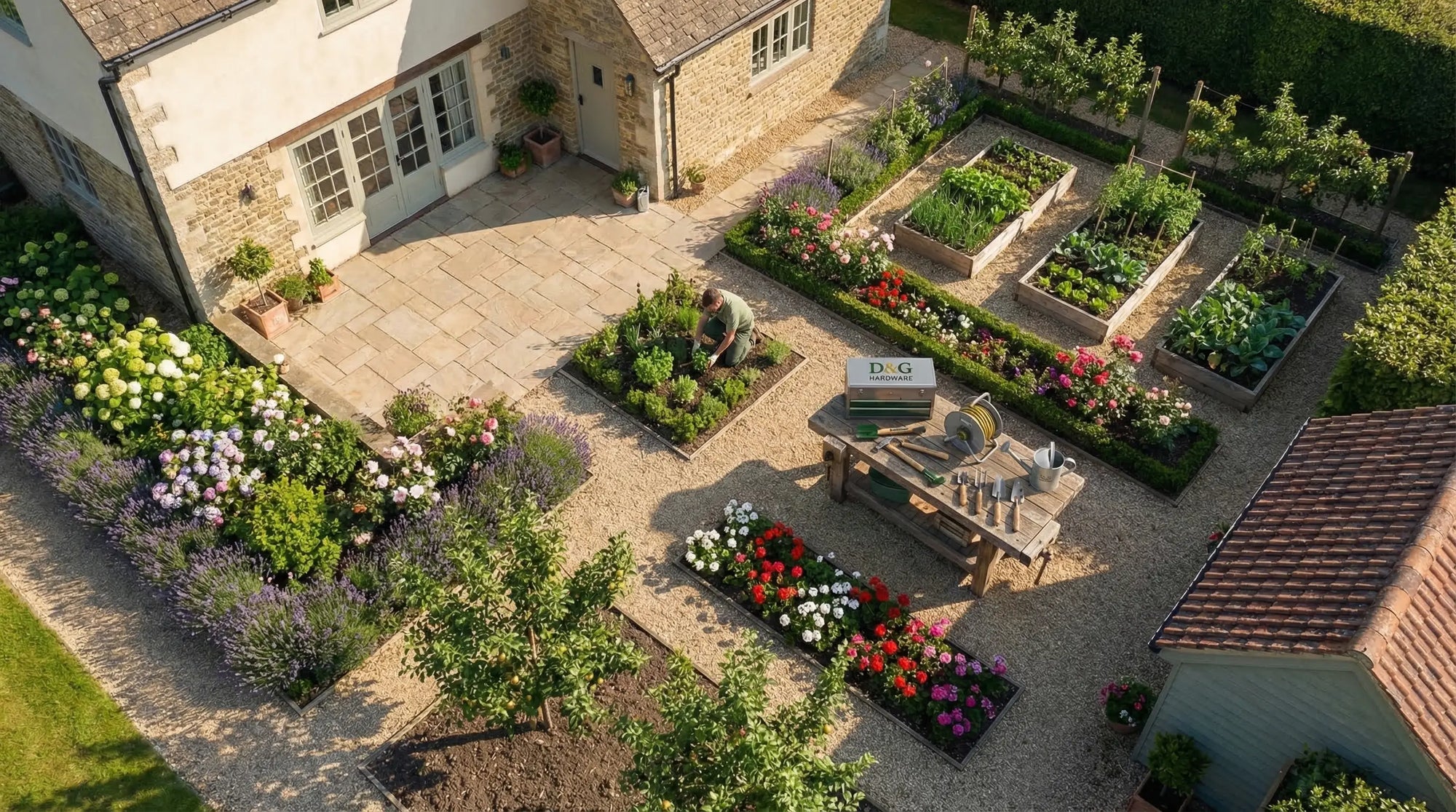 Aerial view of a well-maintained garden with various plants and a patio area.